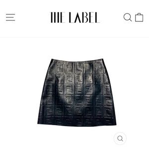 Black monogram faux leather skirt